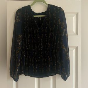 Peplum accordian blouse
